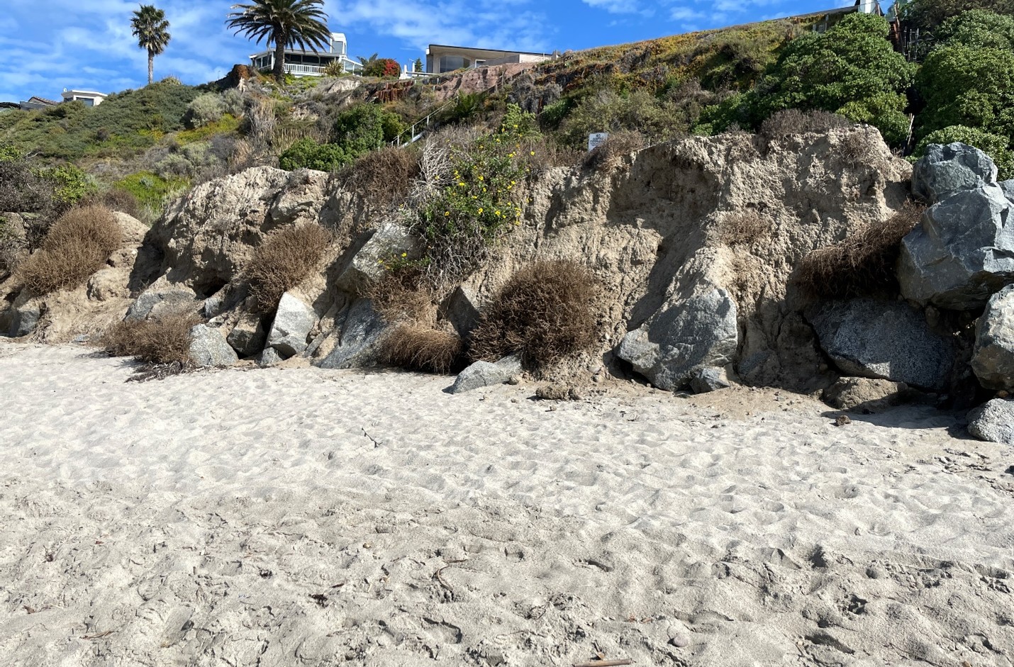 Shoreline protection structure area where some existing rock is present