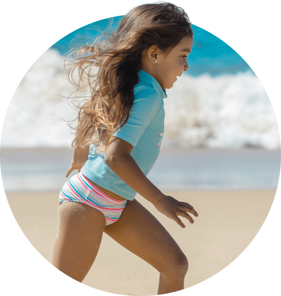 Girl running on beach